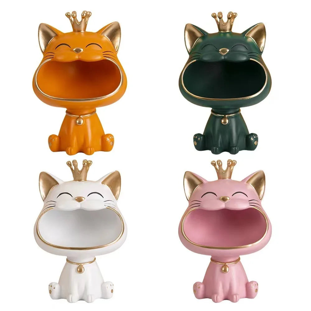 Four Creative Cat Key Box figurines by KittyNook Cat Co. in orange, green, white & pink—perfect for cat-themed organization.