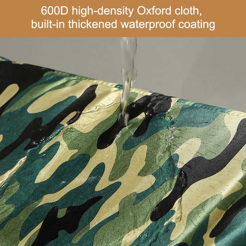 Water beads on the green camo Oxford cloth of the KittyNook Cat Co. PurrFort Waterproof Outdoor Cat Cave.