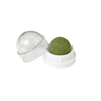 Thumbnail for The Stick-On Natural Catnip Ball for Cats by KittyNook Cat Co.—an interactive treat toy with a clear-lidded white holder.