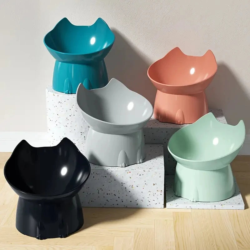 Five colorful chairs mimic the KittyNook Cat Co. Orthopedic Raised Cat Feeder displayed on terrazzo platforms.