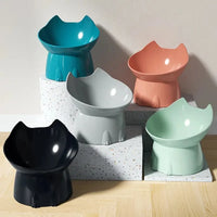 Thumbnail for Five colorful chairs mimic the KittyNook Cat Co. Orthopedic Raised Cat Feeder displayed on terrazzo platforms.