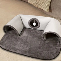Thumbnail for The KittyNook Cat Co. Interactive U-shaped Cat Tunnel features two tunnels, a soft mat, and hanging pom-pom toy.