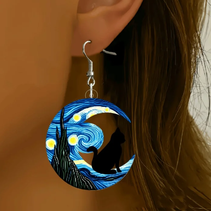 KittyNook Cat Co.'s Van Gogh Starry Night Black Cat Acrylic Earrings feature a crescent moon and cat silhouette design.