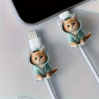 Thumbnail for Two MeowGuard Cat Cable Protectors from KittyNook Cat Co. (kittens in teal hoodies) sit by a smartphone.